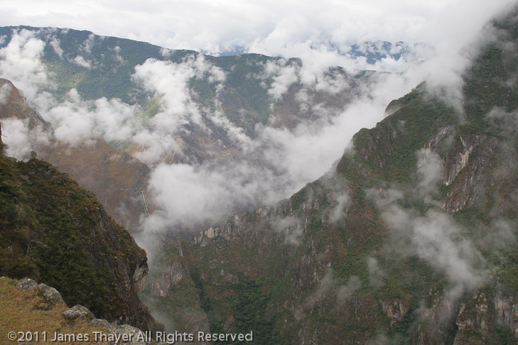 Morning clouds rise up from the Urubamba Valley