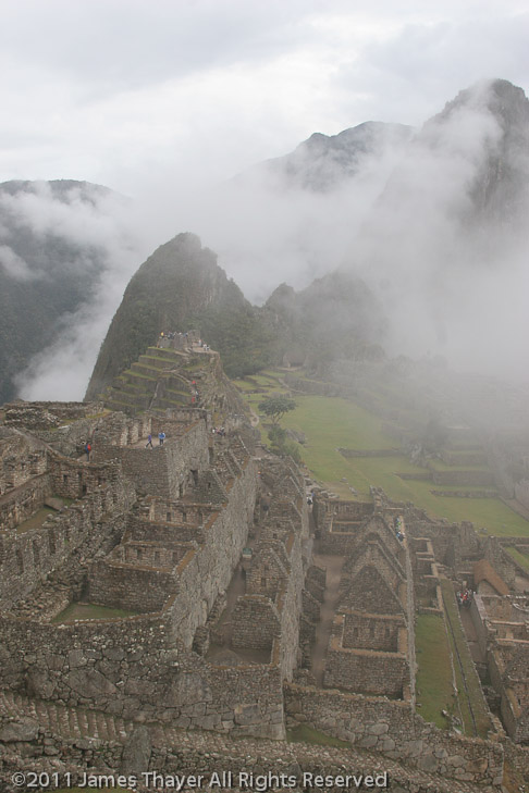 Machu Picchu in partial fog.