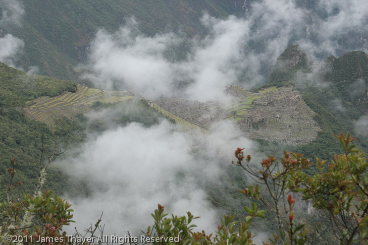 Machu Picchu in partial fog.